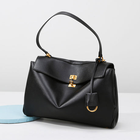 Elegant Black Leather Handbag with Gold Accents - Versatile Shoulder and Hand Carry