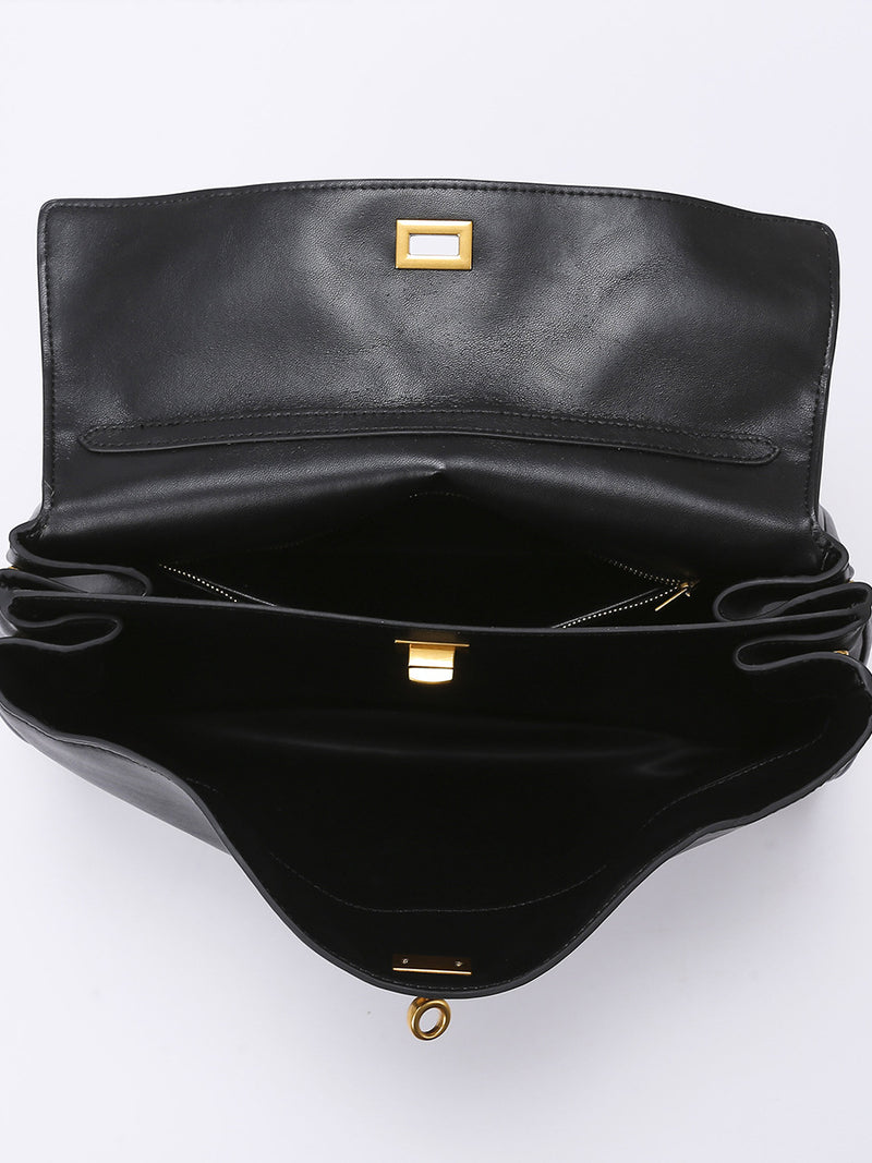 Elegant Black Leather Handbag with Gold Accents - Versatile Shoulder and Hand Carry